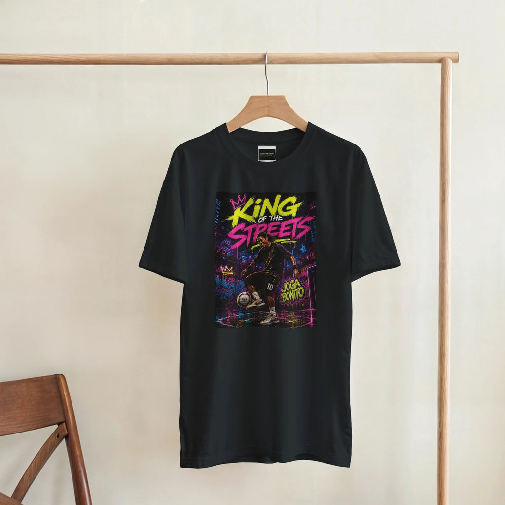 Black T-shirt hanging on a wooden hanger, front graphic design