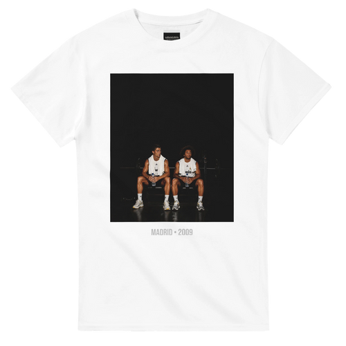 White short-sleeve T-shirt with front graphic of two soccer players and text, Madrid 2009