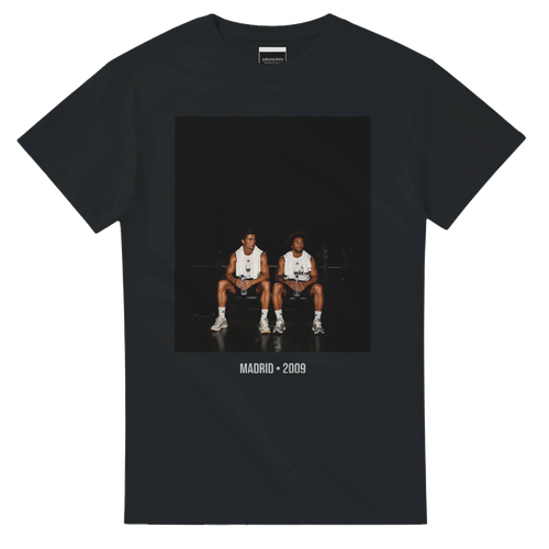 Black short-sleeve T-shirt with front graphic of two soccer players and text, Madrid 2009