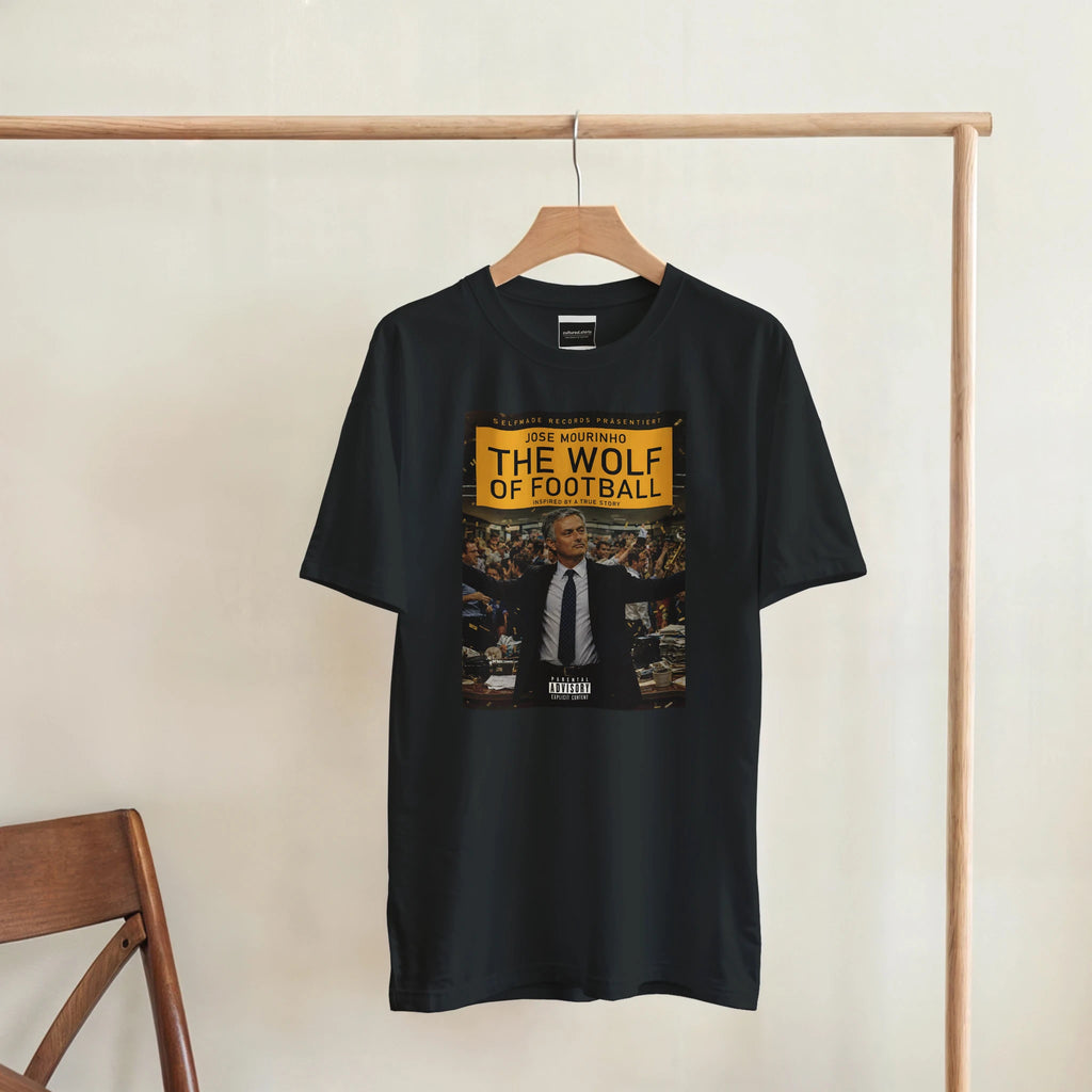 Black T-shirt on hanger with 'THE WOLF OF FOOTBALL' front graphic