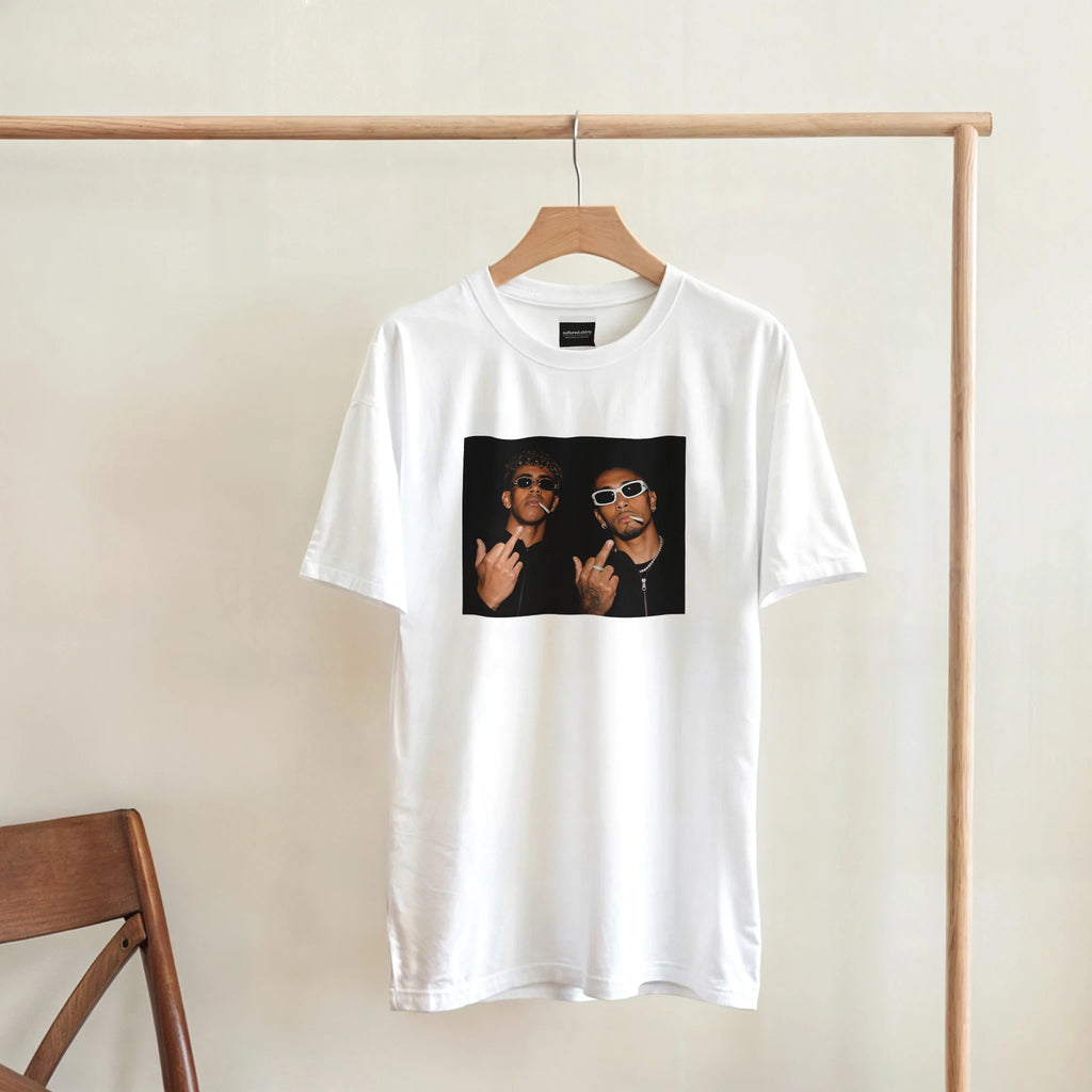 White cotton T-shirt on hanger with front rectangular graphic of two men