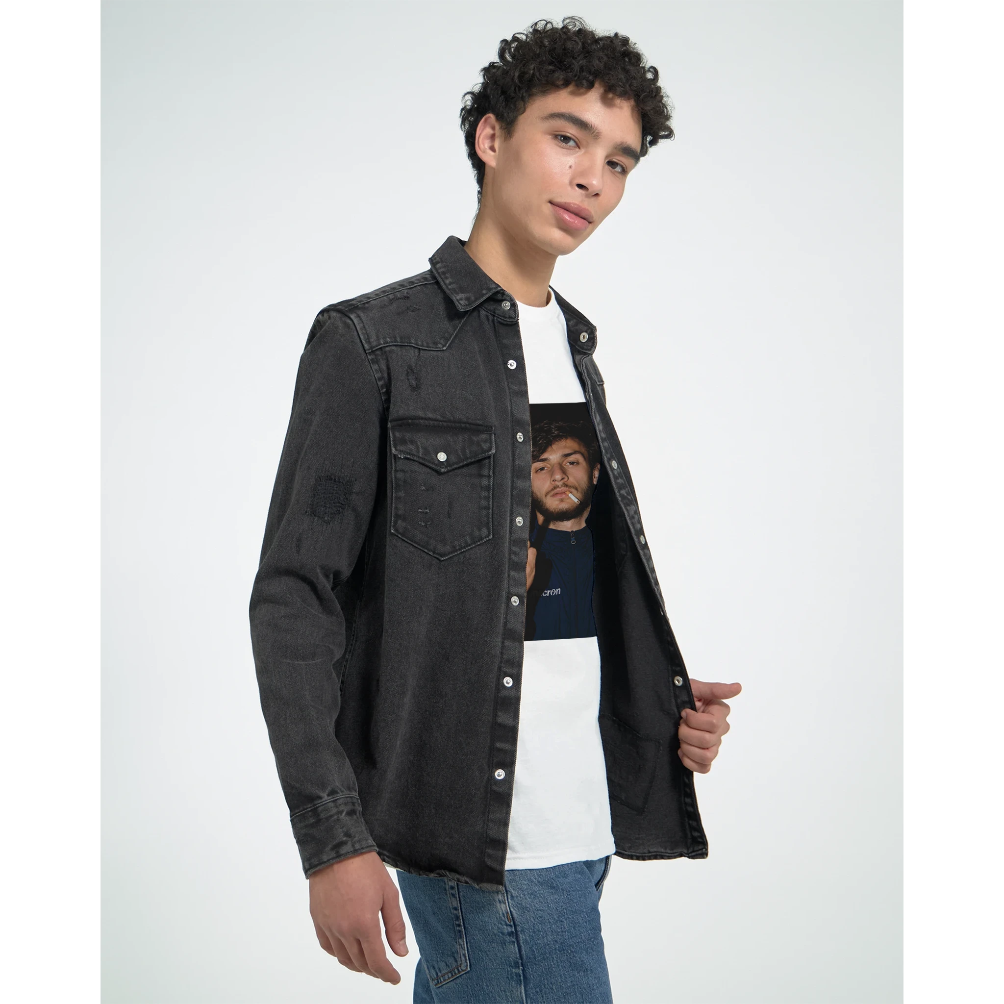 White crewneck T-shirt with small square portrait graphic, worn under jacket