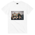 White T-shirt with rectangular front graphic showing two men seated.