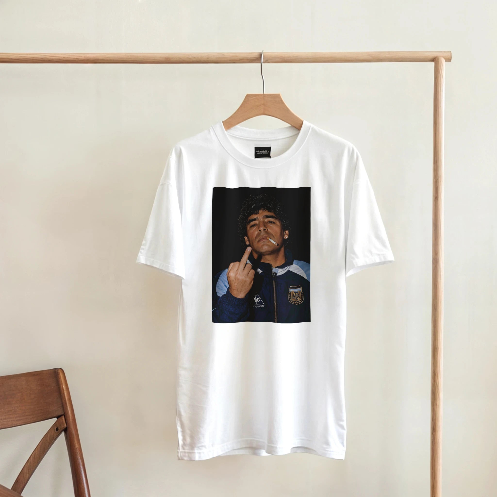 White crewneck football tee with square portrait graphic on the chest